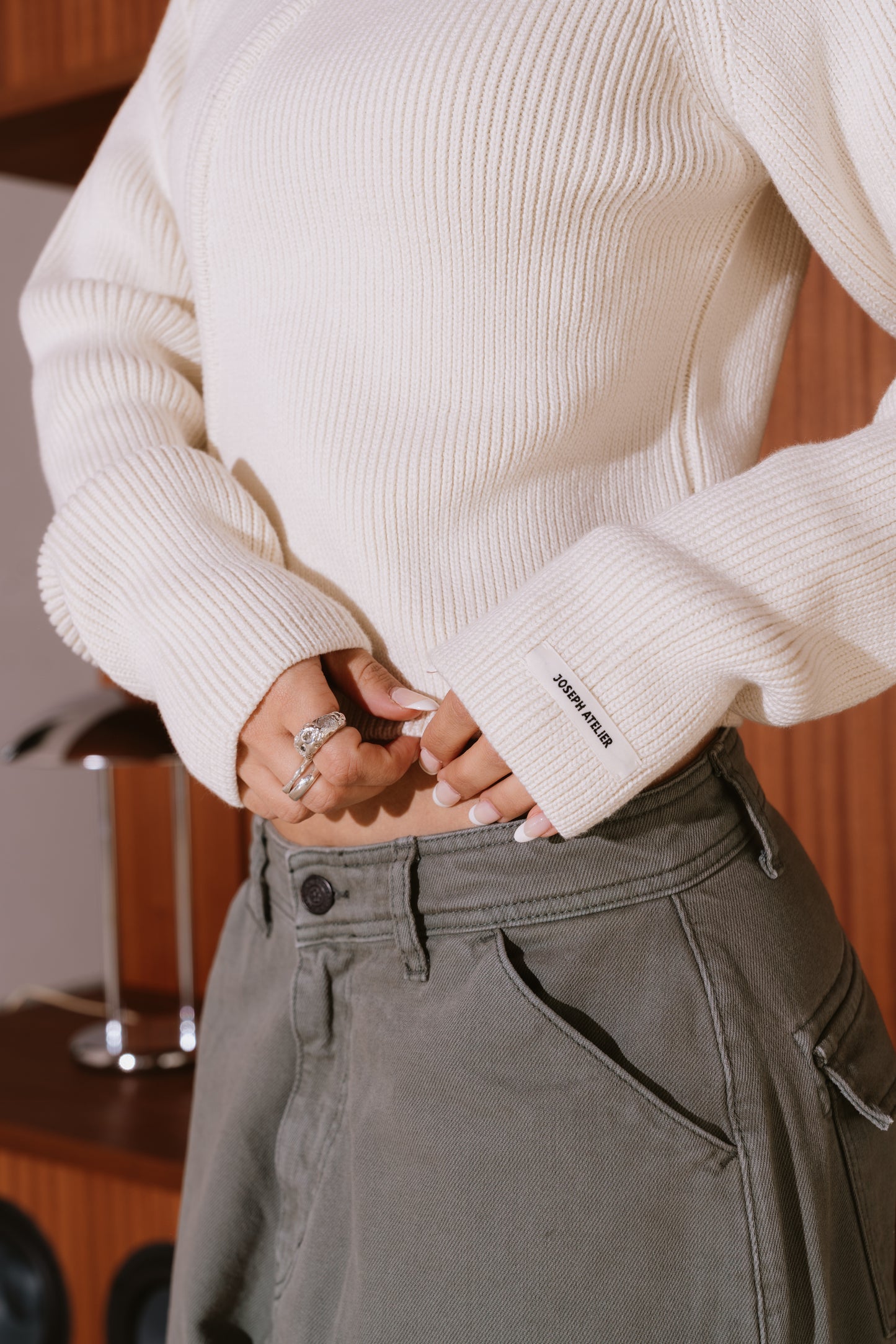 asymetric zip sweater cream